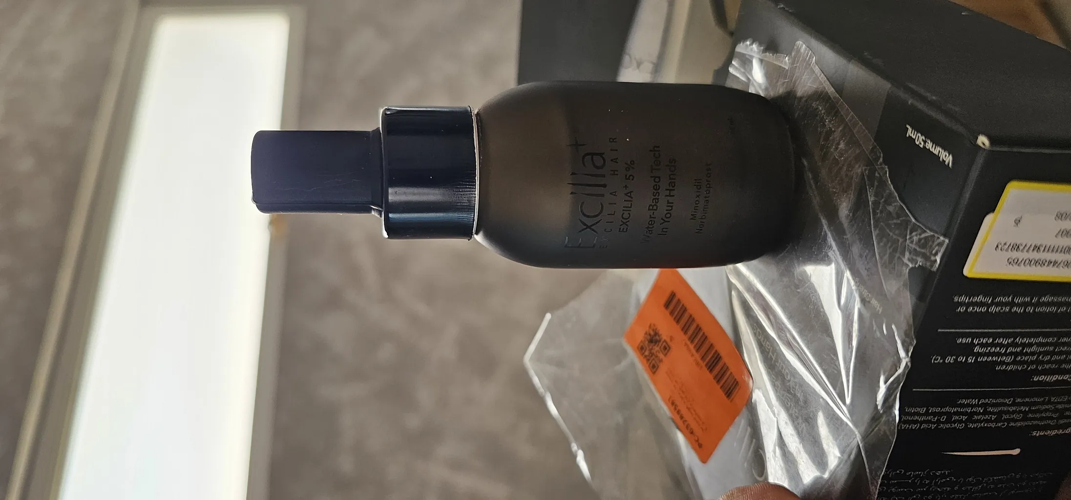 لوسیون ضد ریزش و تقویت کننده مو اکسیلیا هیر پلاس مدل ماینوکسیدیل 5 درصد حجم 50 میلی لیتر