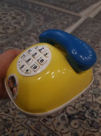 قلک طرح اسباب بازی تلفن و ماشین