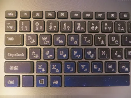 استیکر لپ تاپ توییجین و موییجین طرح Space کد 35 مناسب برای لپ تاپ 15.6 اینچ به همراه برچسب حروف فارسی کیبورد