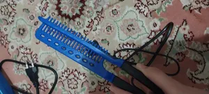 تجریه خرید اتو مو نانوتیتانیوم کد 3IN1 به همراه فر کننده مو و شانه مو