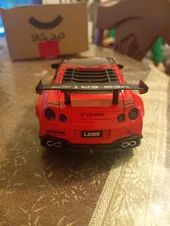 تجریه خرید ماشین بازی چه ژی مدل نیسان طرح GRT موزیکال کد CZ128ADT2