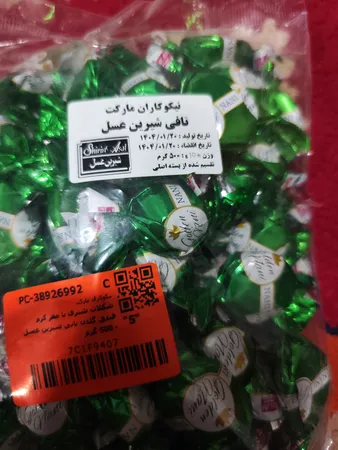 شکلات شیری با مغز کرم فندق گلدن نانی شیرین عسل - 500 گرم