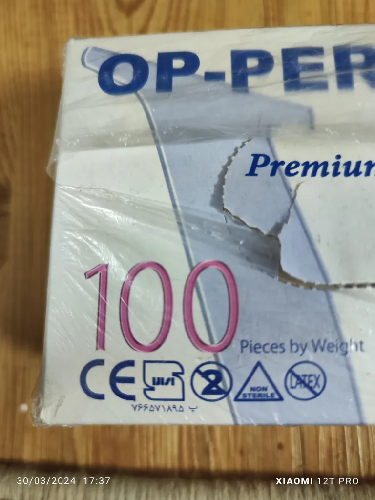 دستکش وینیل او پی پرفکت مدل AM-L سایز لارج بسته 100 عددی