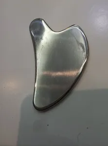 تجریه خرید ماساژور دستی صورت مدل گوآشا استیل