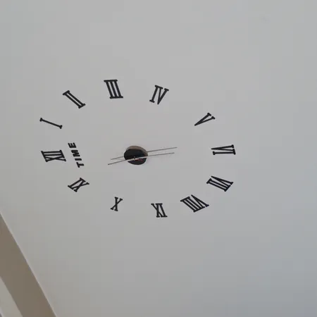 ساعت دیواری دکوراتیو مدل طرح رومی سایز 120