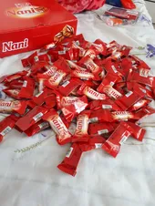 تجریه خرید شکلات مغز دار نانی شیرین عسل -800 گرم بسته 100 عددی