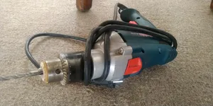 تجریه خرید دریل چکشی 30 میلی‌متری 810 وات رابین مدل R1015