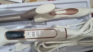 تجریه خرید اتو مو کنورث مدل kw313 به همراه فر کننده مو