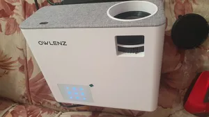 تجریه خرید ویدئو پروژکتور النز مدل SD500 Smart Android به همراه پرده نمایش و دو کنترل