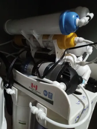 دستگاه تصفیه کننده آب آکوآ اسپرینگ مدل NF - SF4400 به همراه فیلتر تصفیه اب کد 01 مجموعه 3 عددی