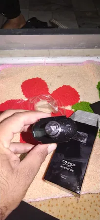 ادو پرفیوم مردانه فیستا مدل Creed Aventus حجم 100 میلی لیتر به همراه عطر جیبی مردانه فیستا حجم 15 میلی لیتر