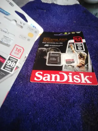 کارت حافظه microSDXC سن دیسک مدل Extreme PRO کلاس A2 استاندارد UHS-I U3 سرعت 170MBs ظرفیت 64 گیگابایت به همراه آداپتور SD