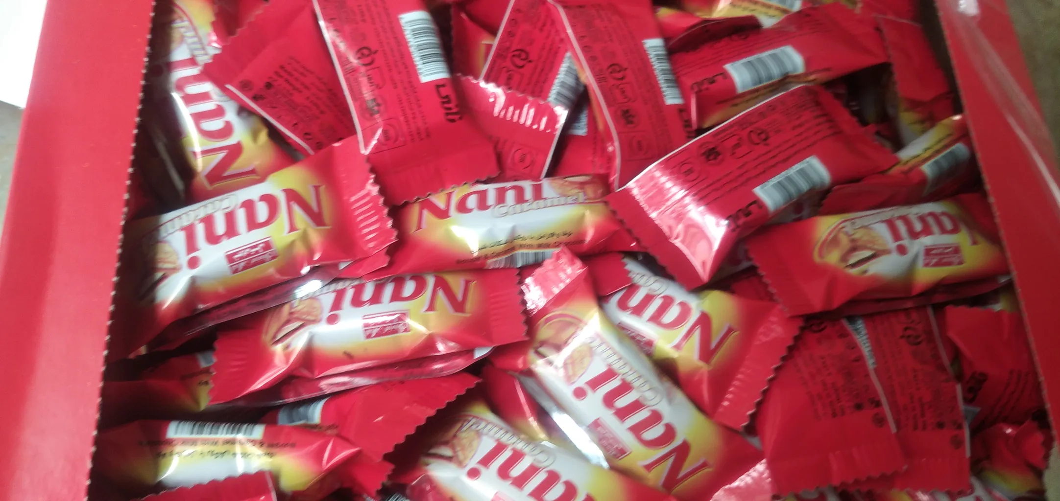 شکلات مغز دار نانی شیرین عسل -800 گرم بسته 100 عددی