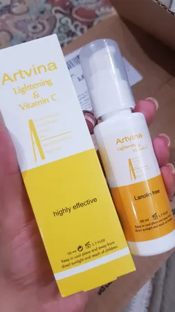 کرم روشن کننده و ضد لک صورت آرت وینا مدل ویتامین C مناسب انواع پوست حجم 50 میلی لیتر