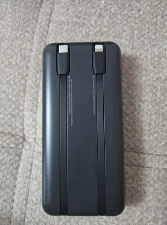 پاوربانک 22.5 وات ریمکس مدل RPP-990 ظرفیت 20000 میلی آمپر ساعت به همراه کابل USB-C و لایتنینگ