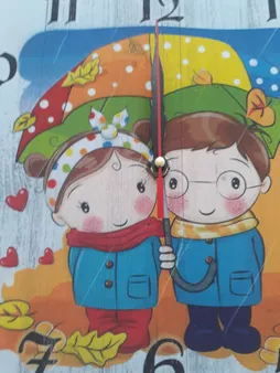 ساعت دیواری کودک مدل 1046 طرح چتر و باران