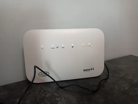 مودم TD-LTE ایرانسل مدل TF-i60 S1 به همراه سیم کارت دو قلو و بسته 50 گیگ یک ماهه