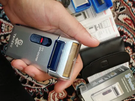 ماشین اصلاح موی صورت یاندو مدل Sv-w301u به همراه تیغه و توری یدک