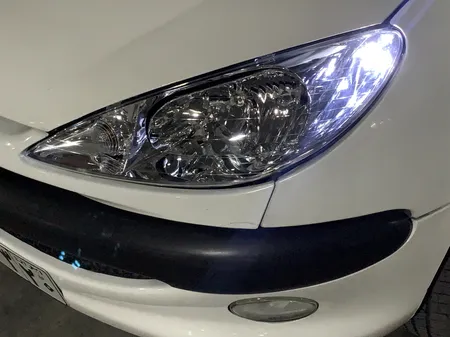 چراغ جلو چپ کروز پلاس مدل CR50060501 مناسب برای پژو 206