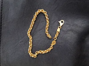 تجریه خرید دستبند زنجیری طلا 18 عیار زنانه طلای مستجابی مدل رولو گلستانه کد R19