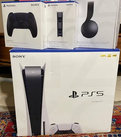 کنسول بازی سونی مدل PlayStation 5 ظرفیت 825 گیگابایت ریجن 1200 آسیا به همراه دسته اضافی و پایه شارژر و هدست