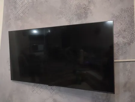 پایه دیواری تلویزیون تی وی جک مدل W8 مناسب برای تلوزیون 43 تا 65 اینچ