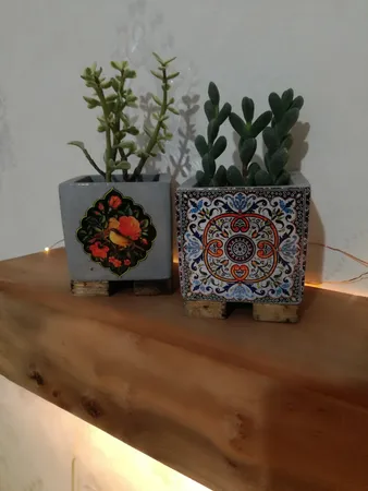 گلدان بتنی طرح گل و مرغ