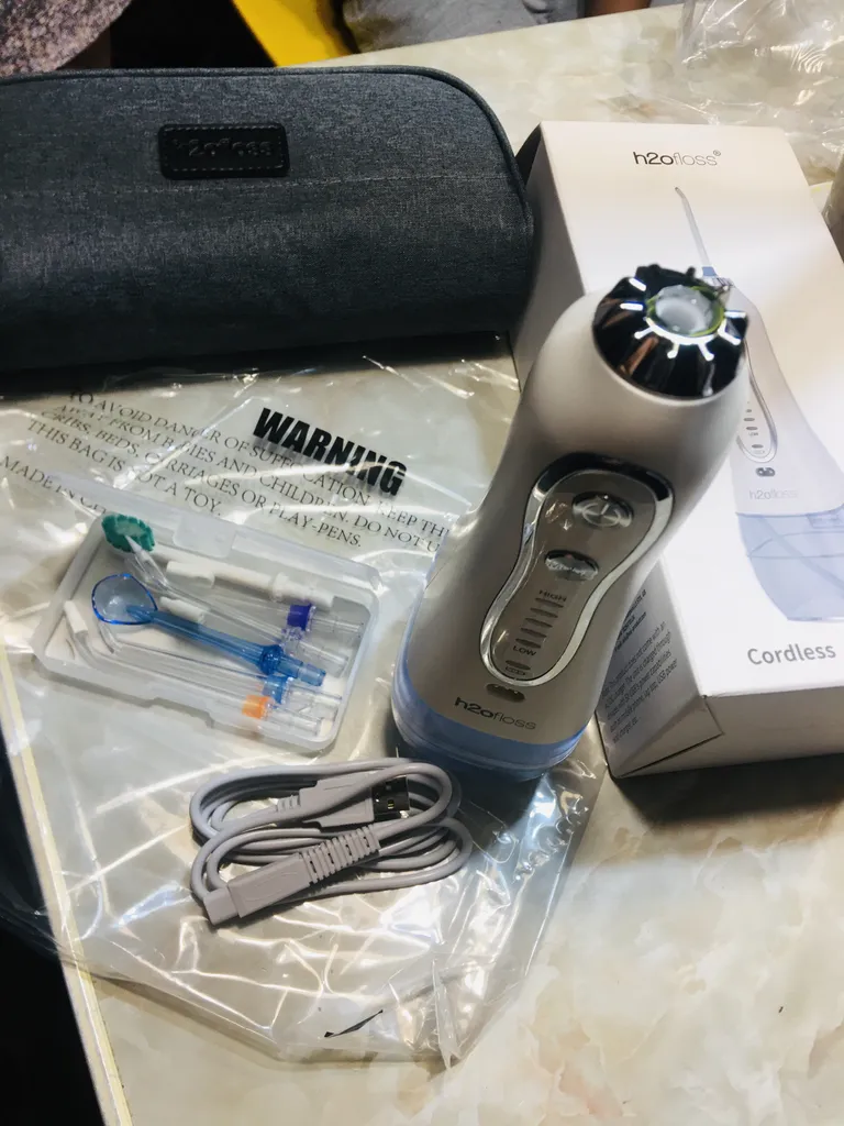 دستگاه شست و شوی دهان و دندان اچ تو اوفلس مدل HF-6