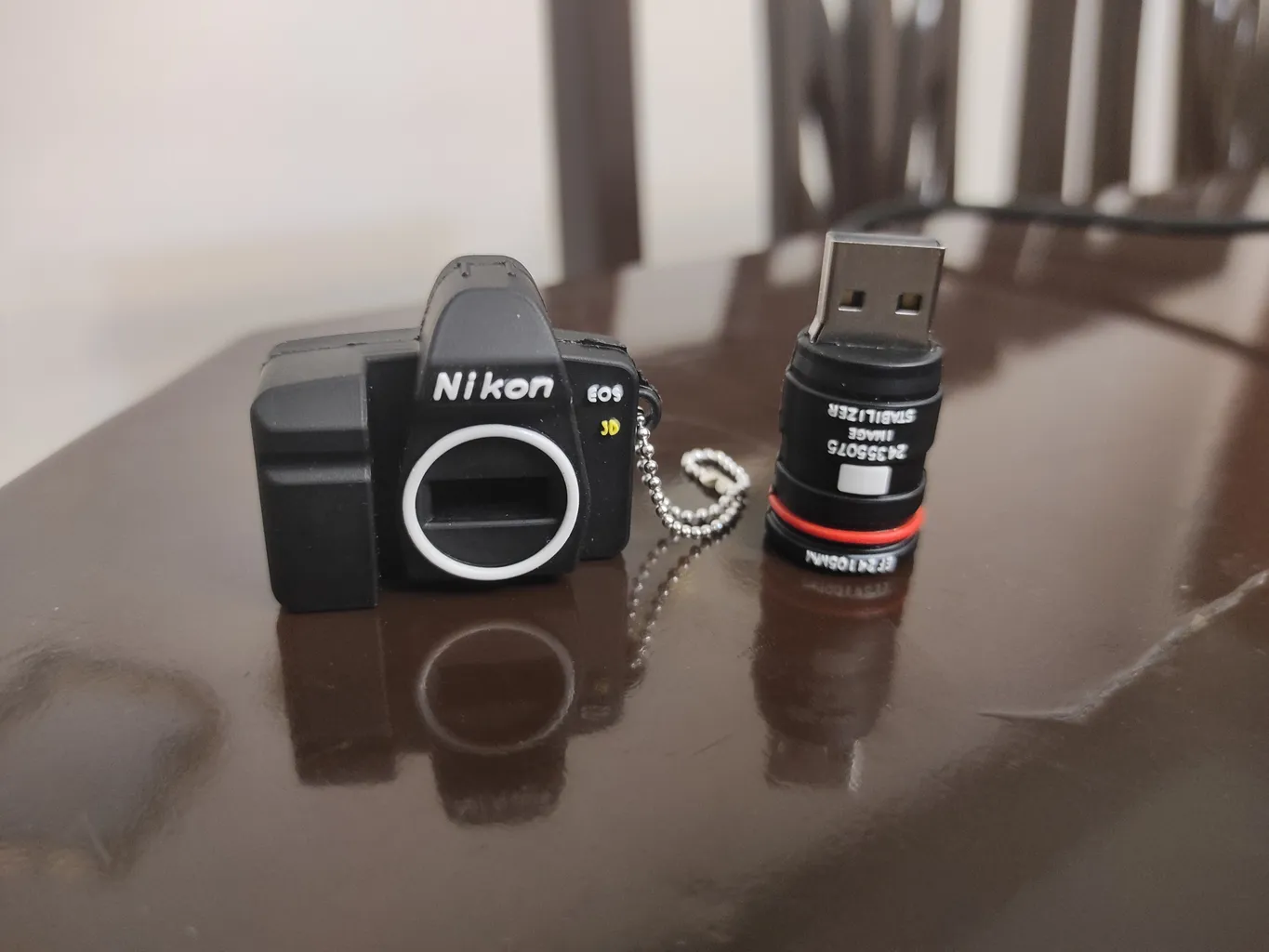 فلش مموری طرح دوربین عکاسی نیکون مدل Ul-CN02 ظرفیت 64 گیگابایت