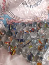 تجریه خرید تیله شیشه ای گلدونه مدل A01 بسته 100 عددی