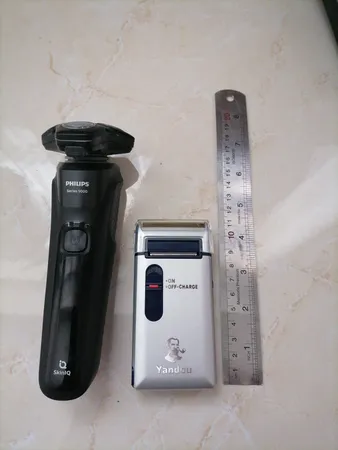 ماشین اصلاح موی صورت یاندو مدل Sv-w301u به همراه تیغه و توری یدک