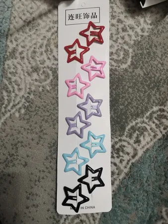 گیره مو دخترانه مدل تق تقی ستاره ای پاستیلی بسته 10 عددی