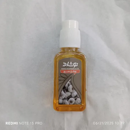 روغن مو نوشاد مدل عصاره سیر حجم 37 میلی لیتر