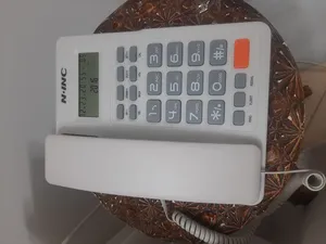 تجریه خرید تلفن ناینک مدل 8204CID