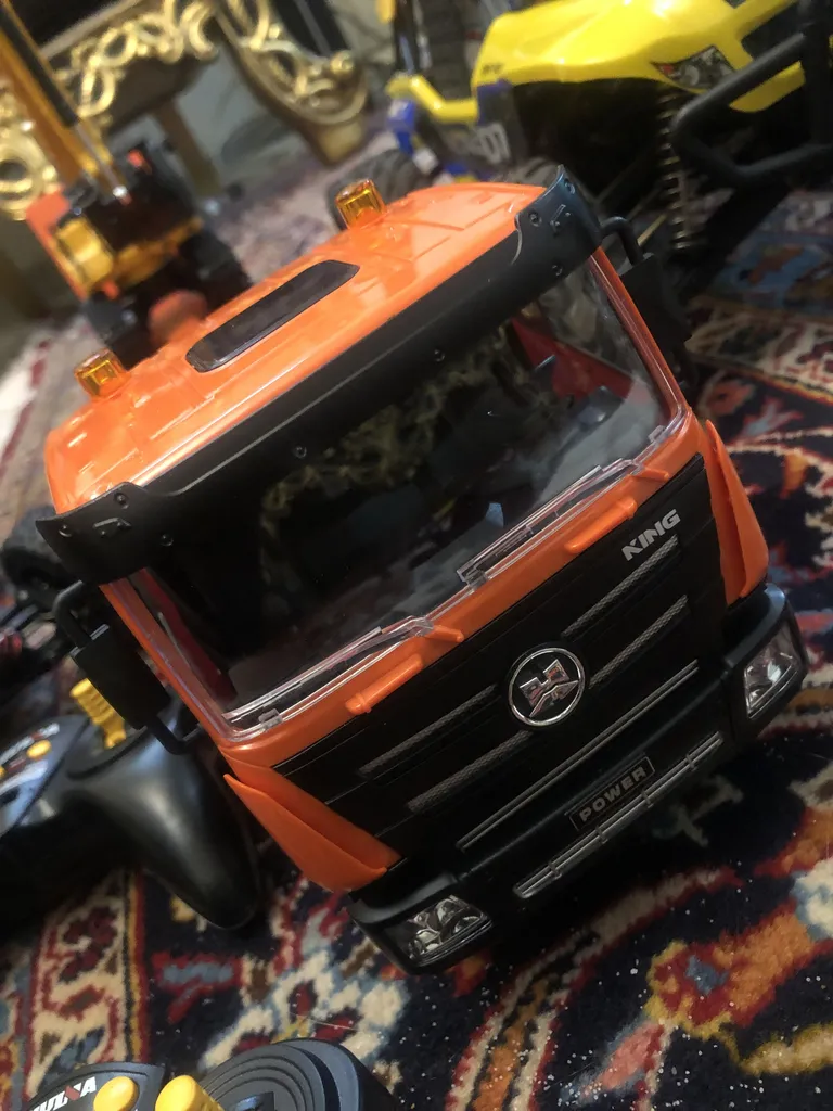 ماشین بازی کنترلی هوینا مدل تریلی 12 چرخ حمل بیل مکانیکی مجموعه دو عددی