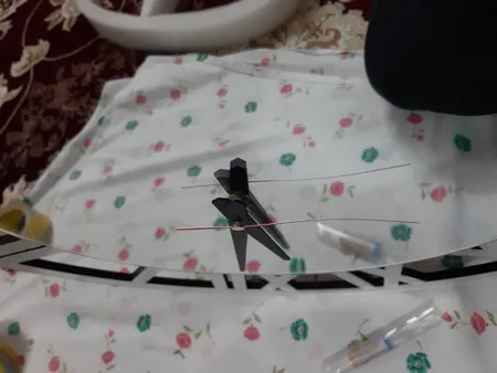 ساعت دیواری اِلِنسی مدل Helios به همراه آینه