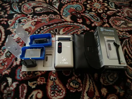 ماشین اصلاح موی صورت یاندو مدل Sv-w301u به همراه تیغه و توری یدک