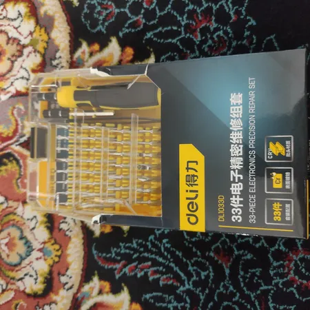 پیچ گوشتی دلی مدل DL1033D مجموعه 33 عددی