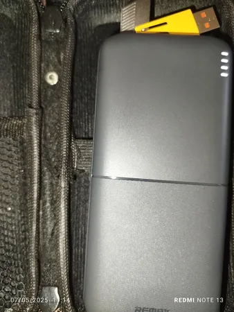 پاوربانک 12 وات ریمکس مدل RPP-26 ظرفیت 20000 میلی آمپر ساعت