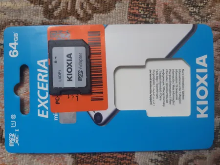 کارت حافظه‌ microSDHC کیوکسیا مدل EXCERIA کلاس 10 استاندارد UHS-I U1 سرعت 100MBps ظرفیت 64 گیگابایت به همراه آداپتور SD