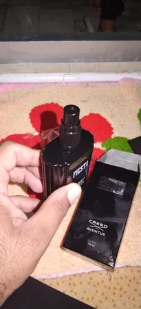 ادو پرفیوم مردانه فیستا مدل Creed Aventus حجم 100 میلی لیتر به همراه عطر جیبی مردانه فیستا حجم 15 میلی لیتر