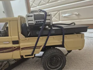 تجریه خرید ماشین بازی کنترلی ام ان مدل وانت تویوتا لندکروز