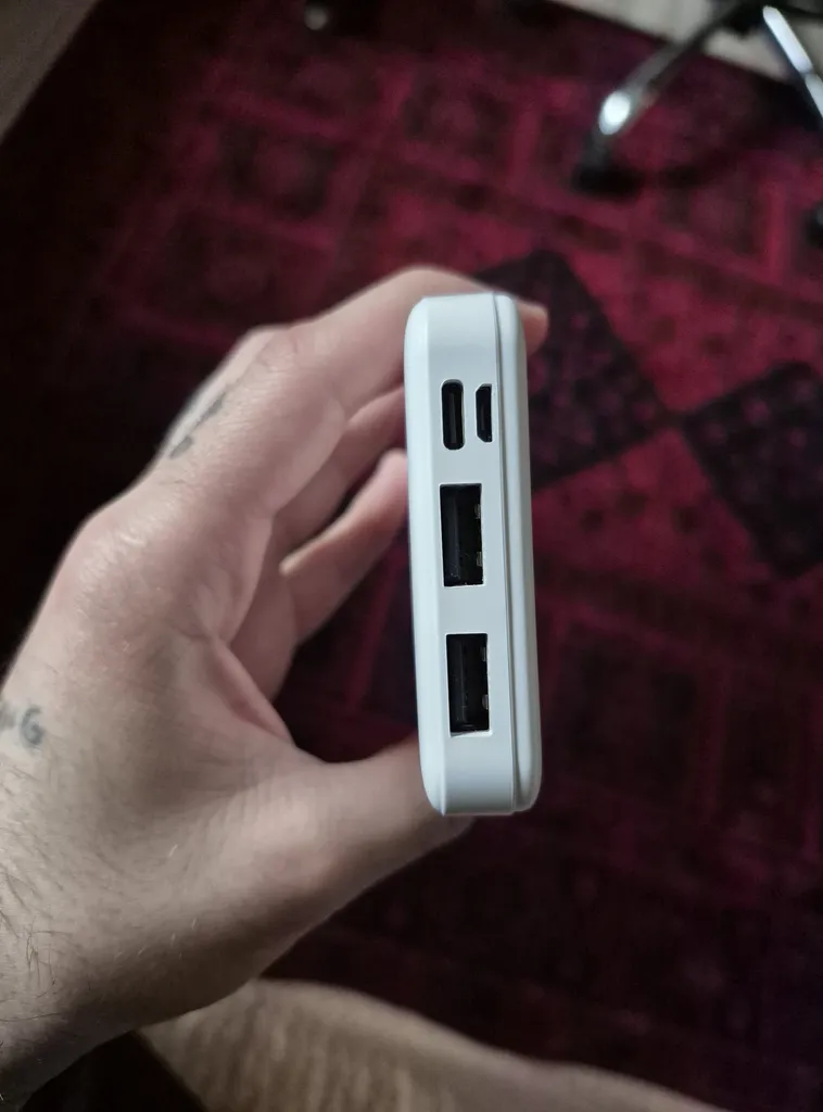 پاوربانک 10 وات وی دنمن وی مدل dp 09 ظرفیت 10000 میلی آمپر ساعت