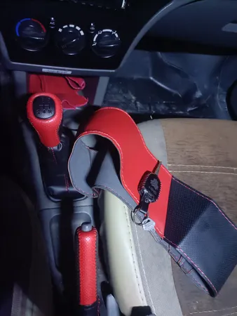 روکش فرمان کاور پلاس مدل PR-LUXE-RD به همراه سردنده وگردگیر و روکش ترمزدستی و کاور سویچ مناسب برای پراید