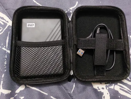 هارد اکسترنال وسترن دیجیتال مدل My Passport ظرفیت پنج ترابایت دارای رابط USB Type-A 3.2