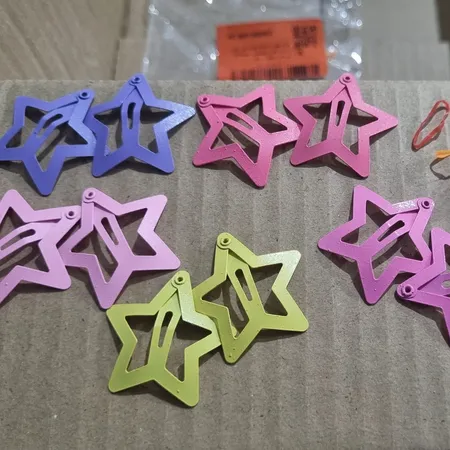 گیره مو دخترانه مدل تق تقی ستاره ای پاستیلی بسته 10 عددی