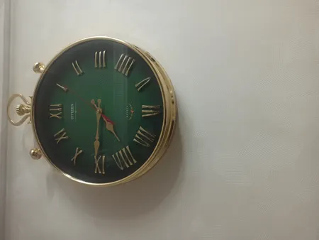 ساعت دیواری سیتی زن مدل 059