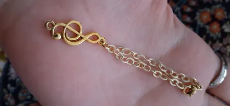 آویز ساعت طرح نت طلایی کد AWD92