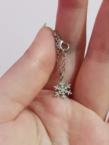 تجریه خرید آویز ساعت زنانه طرح دانه برف