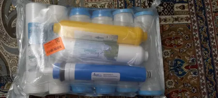 فیلتر دستگاه تصفیه آب آکوا پیورست مدل CE 6900 مجموعه 8 عددی به همراه فیلتر تصفیه آب مدل 75GPD